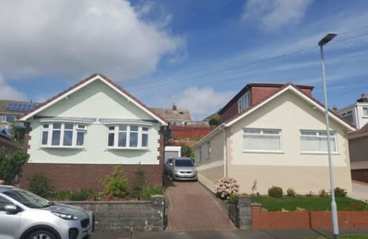 Property after roof rejuvenation - QES Exteriors