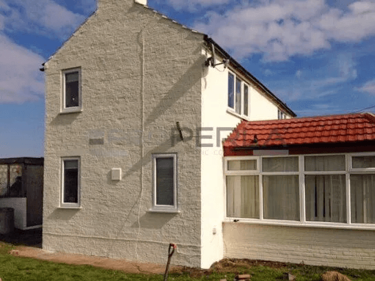 Professional facade coatings application showing enhanced exterior protection