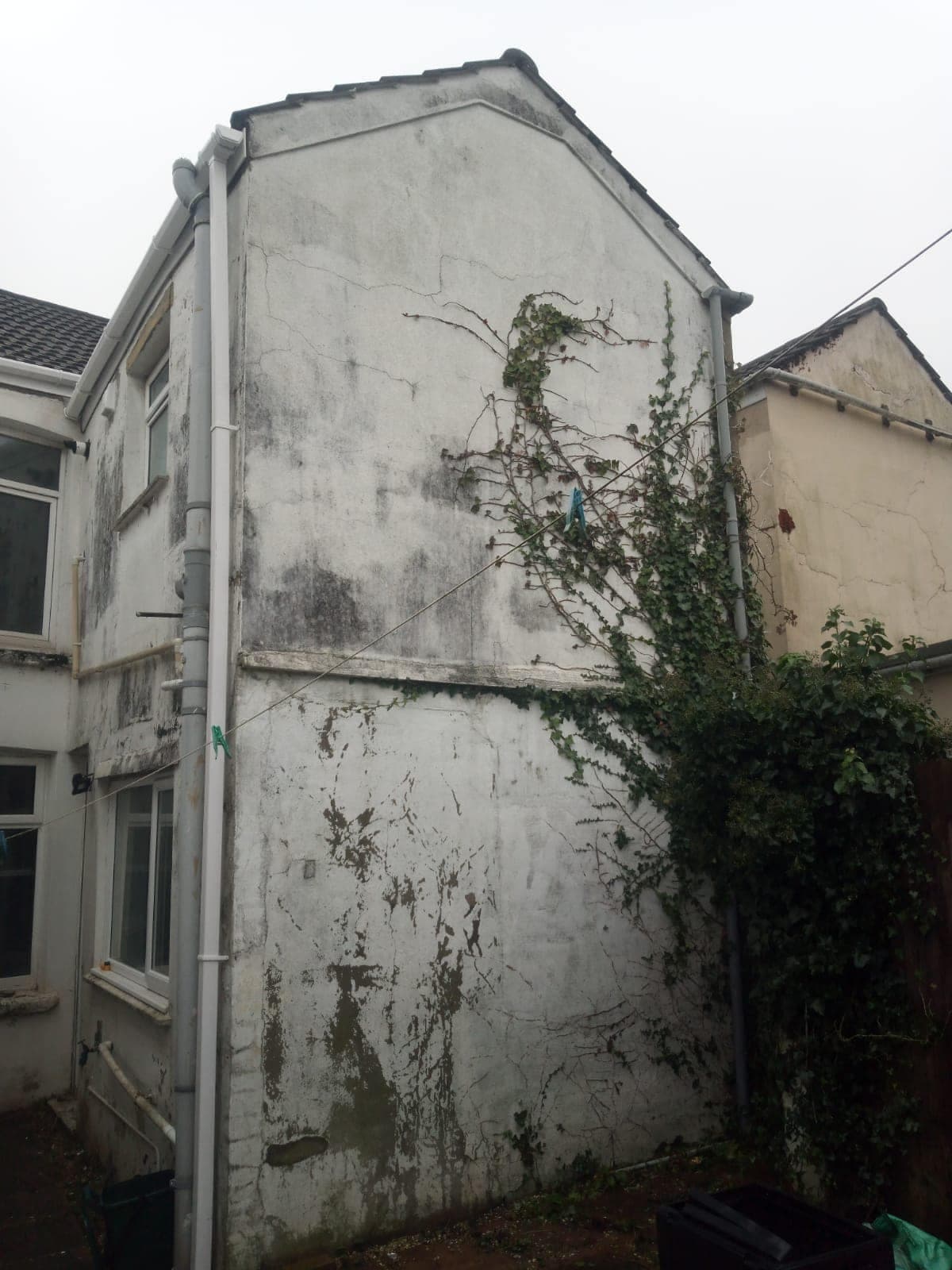 Before - stained render and gable wall, QES Exteriors